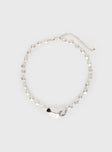 Silver-toned necklace Pearl detail, large pendant, lobster clasp fastening