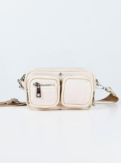 Crossbody bag Nylon material  Silver-toned hardware  Three external pockets  Zip fastenings  Internal pockets  Removable & adjustable strap  Flat base