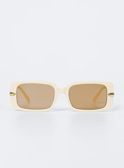 Sunglasses UV 400 Oversized style Rectangle frame Gold-toned detail on arms Moulded nose bridge Beige tinted lenses Lightweight