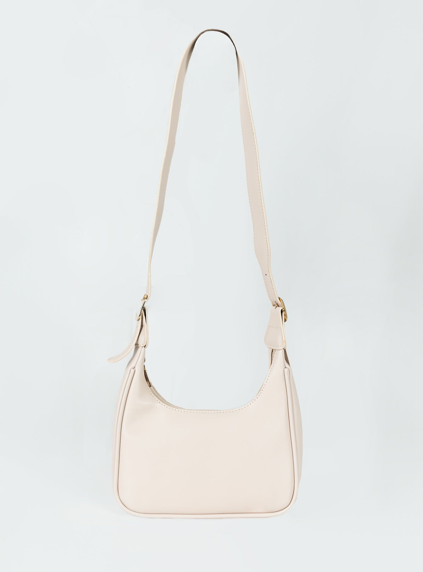 Shoulder bag Gold-toned hardware   Zip fastening  Single internal zip pocket  Flat base 