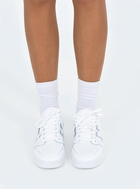 Sneakers Faux leather material Lace up fastening Padded footbed Rounded toe Treaded sole