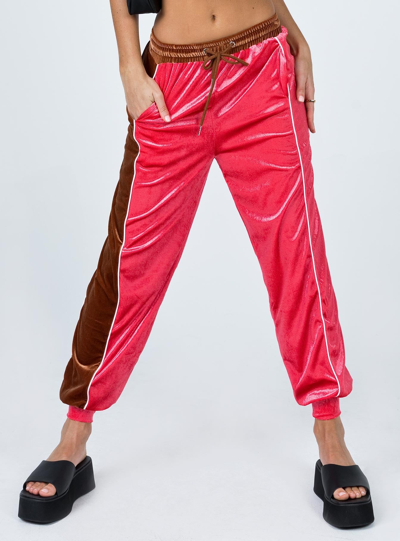 front view of model wearing Princess Polly Harper Velour Track Pants Pink 