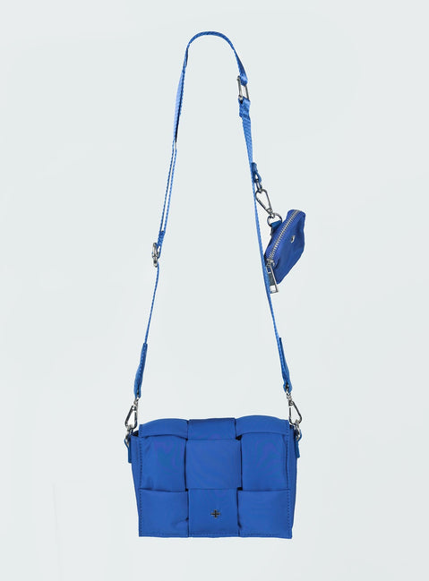 Bag Nylon material  Quilted look  Silver-toned hardware Removable crossbody strap  Removable coin purse on strap  Internal pockets 