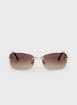 Sunglasses Frameless, brown-tinted lenses, slim silver-toned arms, silicone nose pads