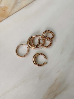 Earring set Set includes three pairs Each style is different Latch fastening Gold toned hardware