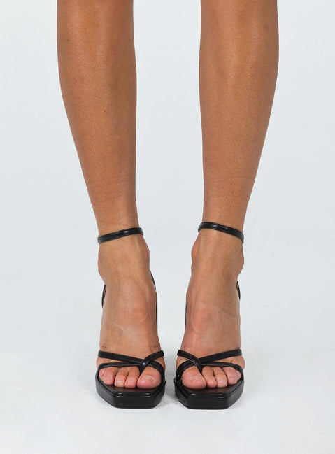 Heels Princess Polly Exclusive Upper & Lining: 100% PU Outer: 100% TPU Faux leather material  Strappy upper  Ankle buckle  Platform base  Black heel  Square toe 