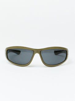 Sunglasses Wrap around design Light weight frame Brown tinted lenses Moulded nose bridge