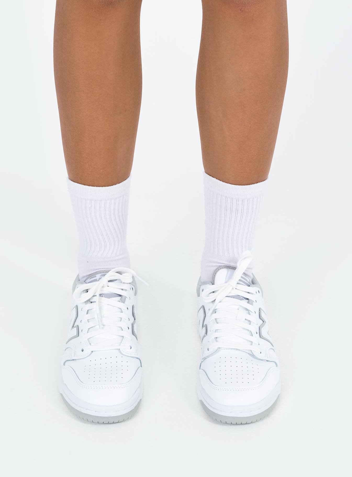 Sneakers Faux leather material Lace up fastening Padded footbed Rounded toe Treaded sole