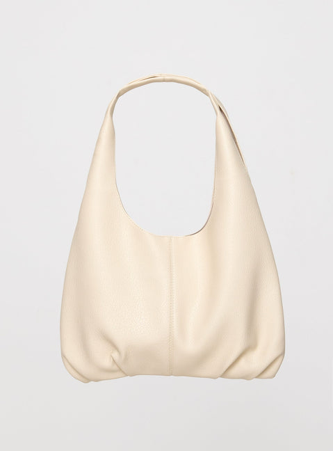 Faux leather shoulder bag Twin fixed handles, magnetic button fastening, separate clutch with zip fastening, gold toned hardware