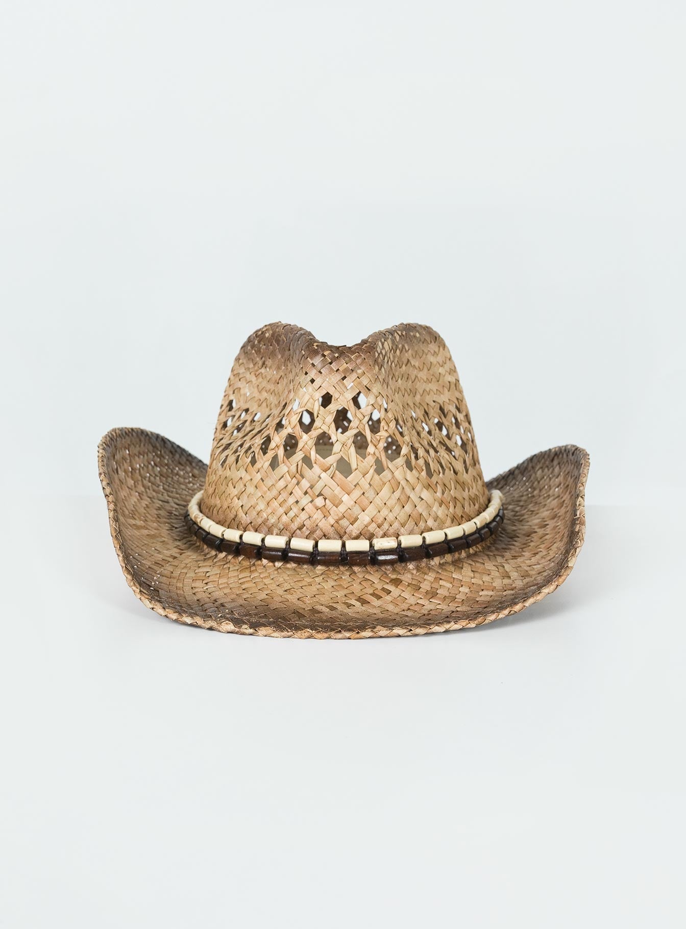 Cowboy hat Woven straw Curved wide brim  Internal adjustable drawstring Mouldable brim shape Bead detail