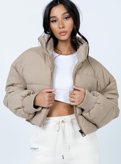 Puffer jacket Oversized fit Zip front fastening High neckline Relaxed sleeves with elasticated cuffs Single internal pocket Fully lined