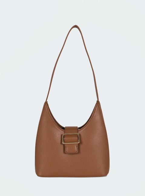 Shoulder bag Faux leather material Fixed shoulder strap Magnetic button fastening Gold-toned hardware Flat base