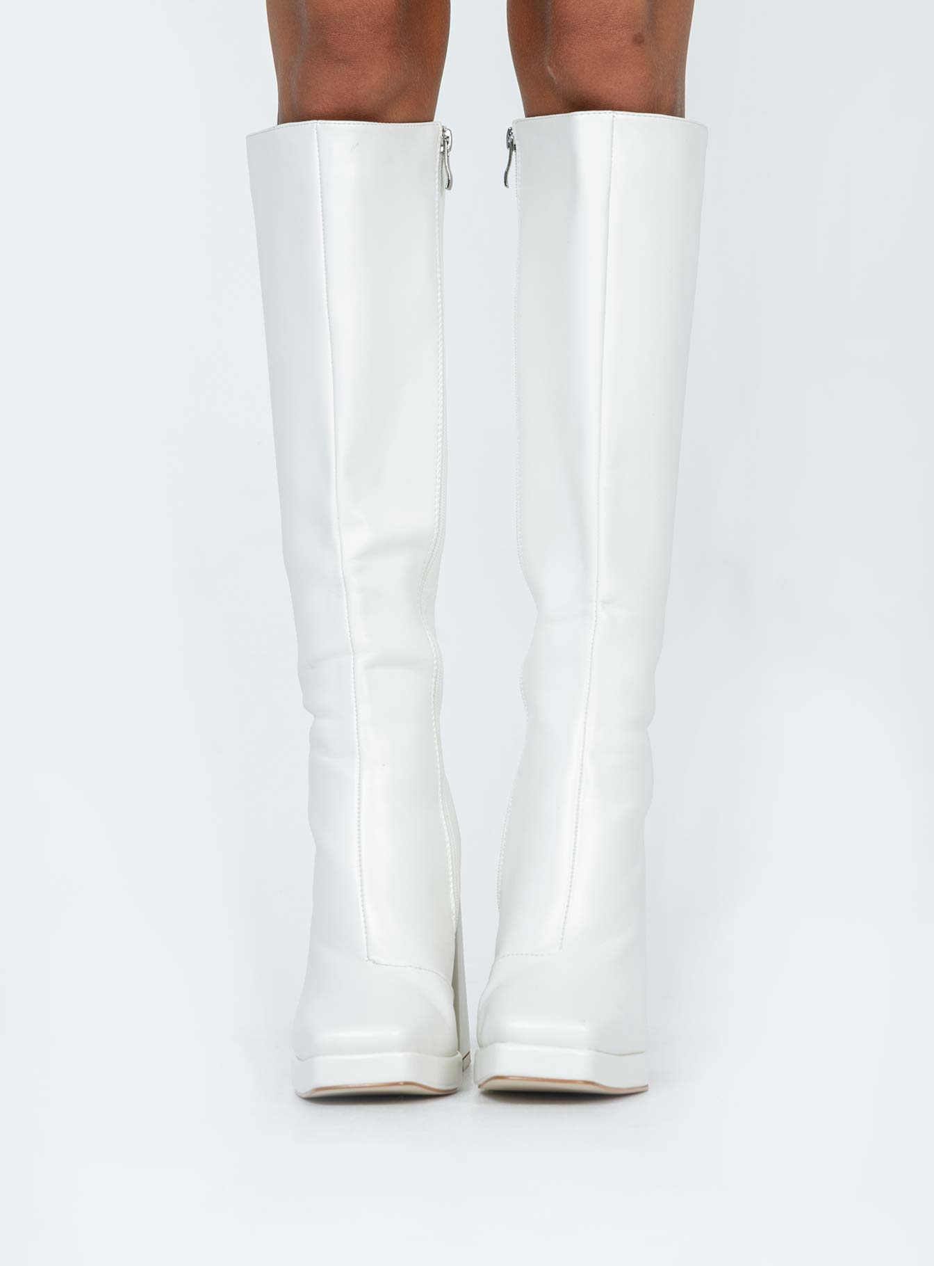 Knee high boots Faux matte leather Platform base Squared toe Thick flared heel Zip fastening at side