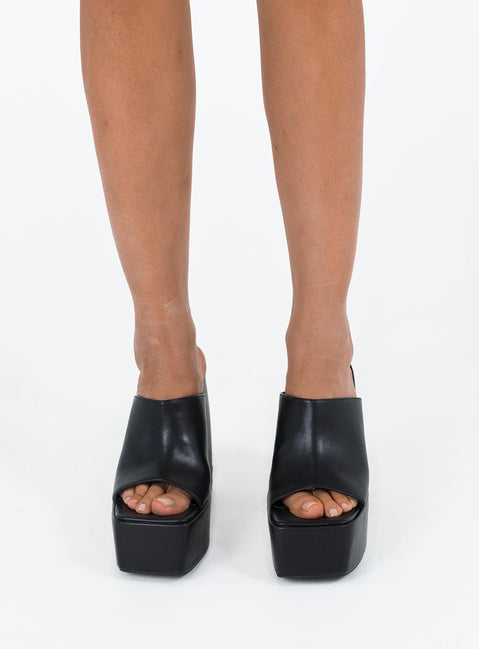 Platform heels Faux leather material Single thick upper Platform base Block heel Square toe