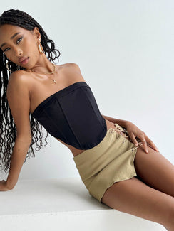 Front view of model wearing  front Princess Polly Sleeveless Asymmetric Neckline  Ludow Strapless Top Black