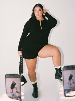 Long sleeve romper Ribbed material Button fastening at front Good stretch