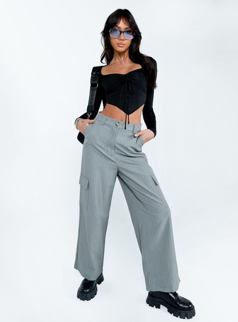 Front view of model wearing  front Princess Polly Full Sleeves High Neck  Kenzie Long Sleeve Top Black