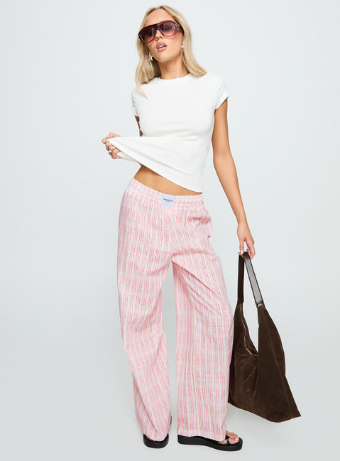 side view of model wearing Princess Polly Beach House Pants Pink Stripe High Waisted Pants 
