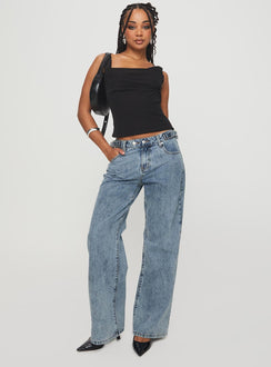 side view of model wearing Princess Polly Sidle Low Rise Jeans Light Wash Low Rise Jeans 