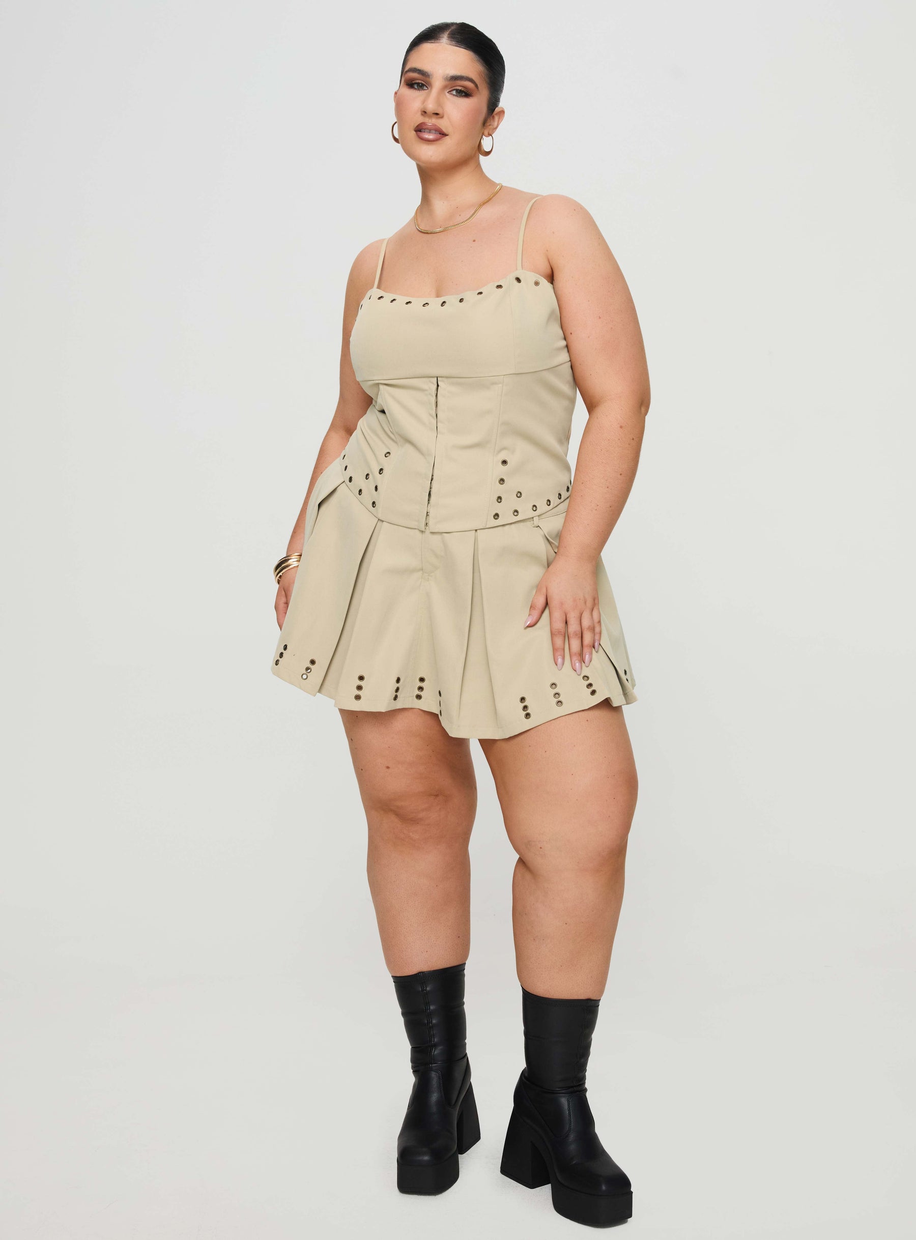 back view of model wearing Princess Polly Alinzia Eyelet Skort Beige Curve Mini Skirts 