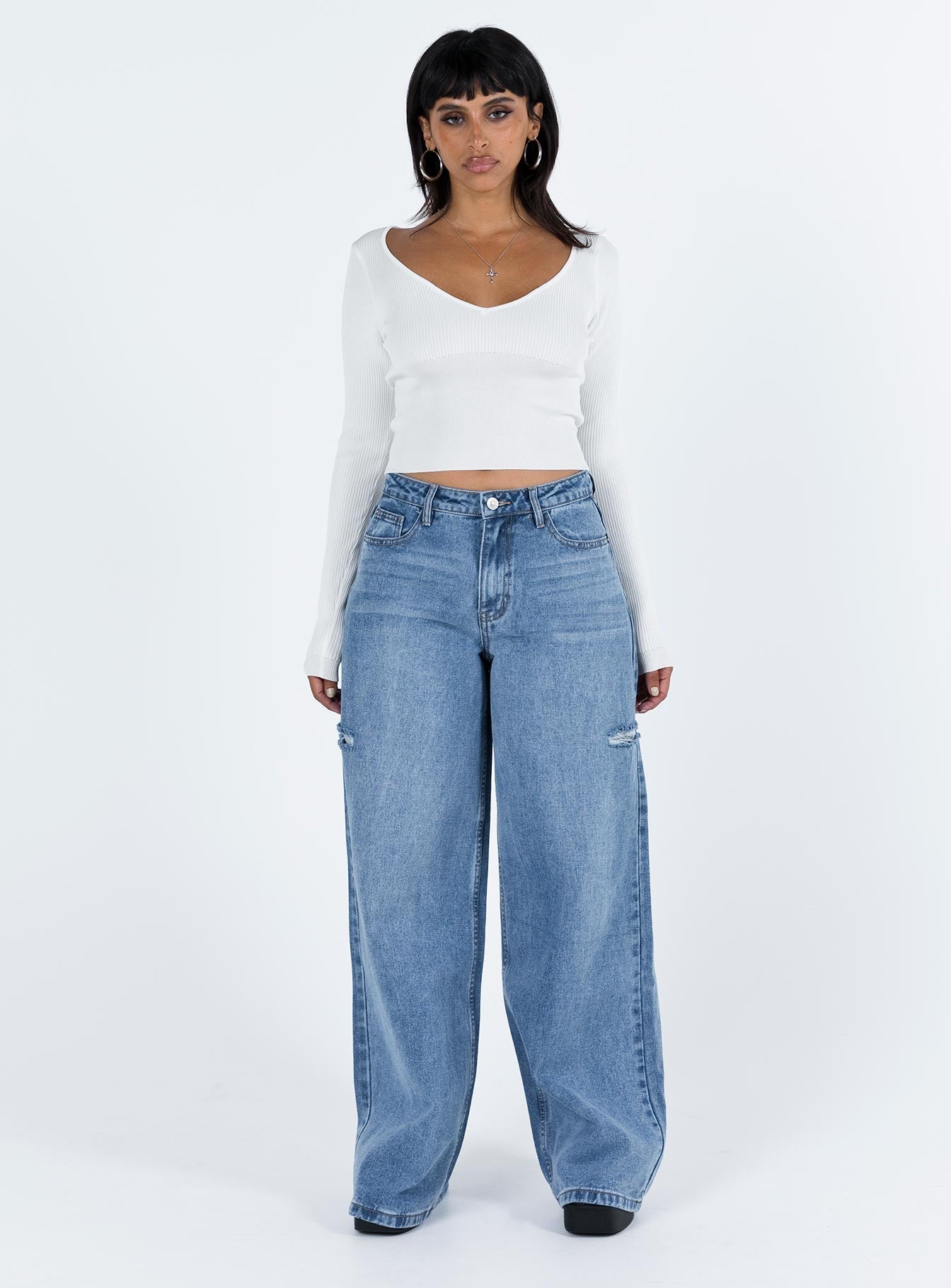 side view of model wearing Princess Polly Shermont Long Sleeve Top Ivory Full Sleeves V-Neck 