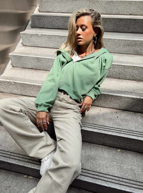 front view of model wearing Princess Polly Calder Zip Hooded Green Cropped 