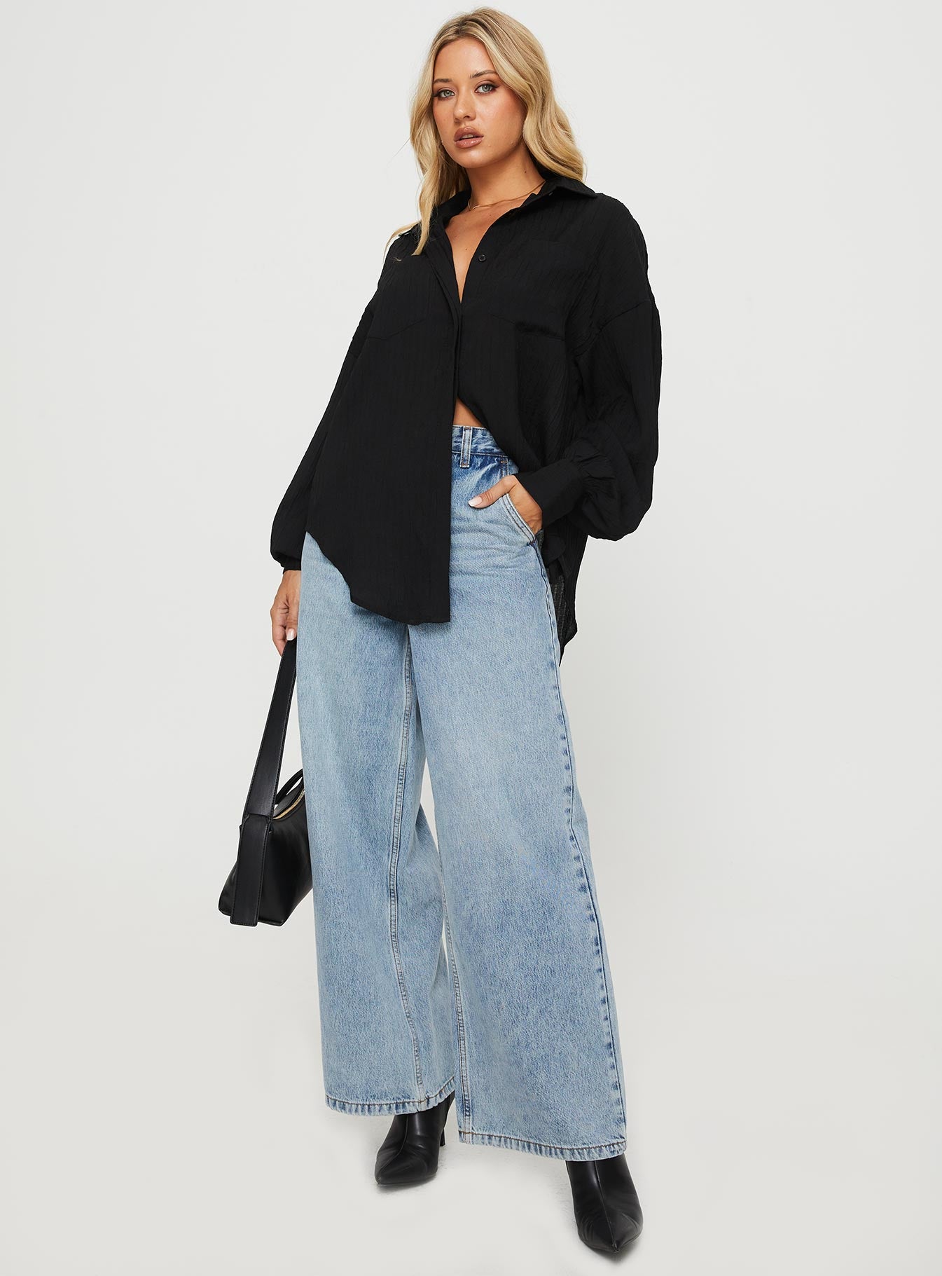 front view of model wearing Princess Polly Kamen Shirt Black Full Sleeves V-Neck 