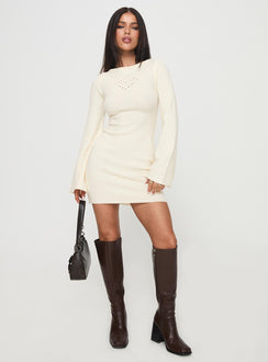side view of model wearing Princess Polly Malcalm Long Sleeve Mini Dress Cream Crew Neck 