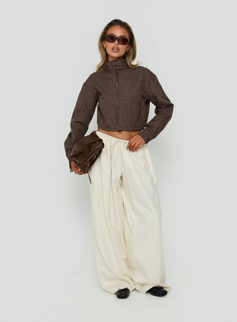 Showcasing the Bungala Oversized Relaxed Pants Ivory womens-regular-pants in high-rise wide-leg silhouette front view of model wearing Princess Polly