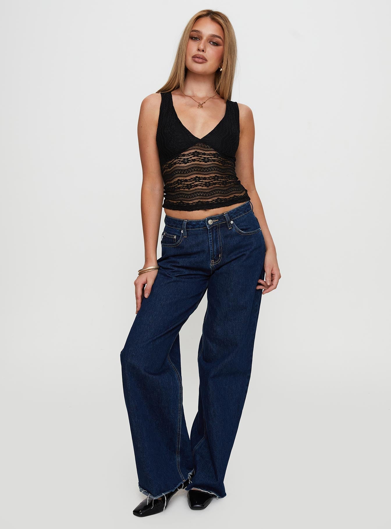 front view of model wearing Princess Polly Loxlee Lace Plunge Neck Top Black Sleeveless V-Neck 