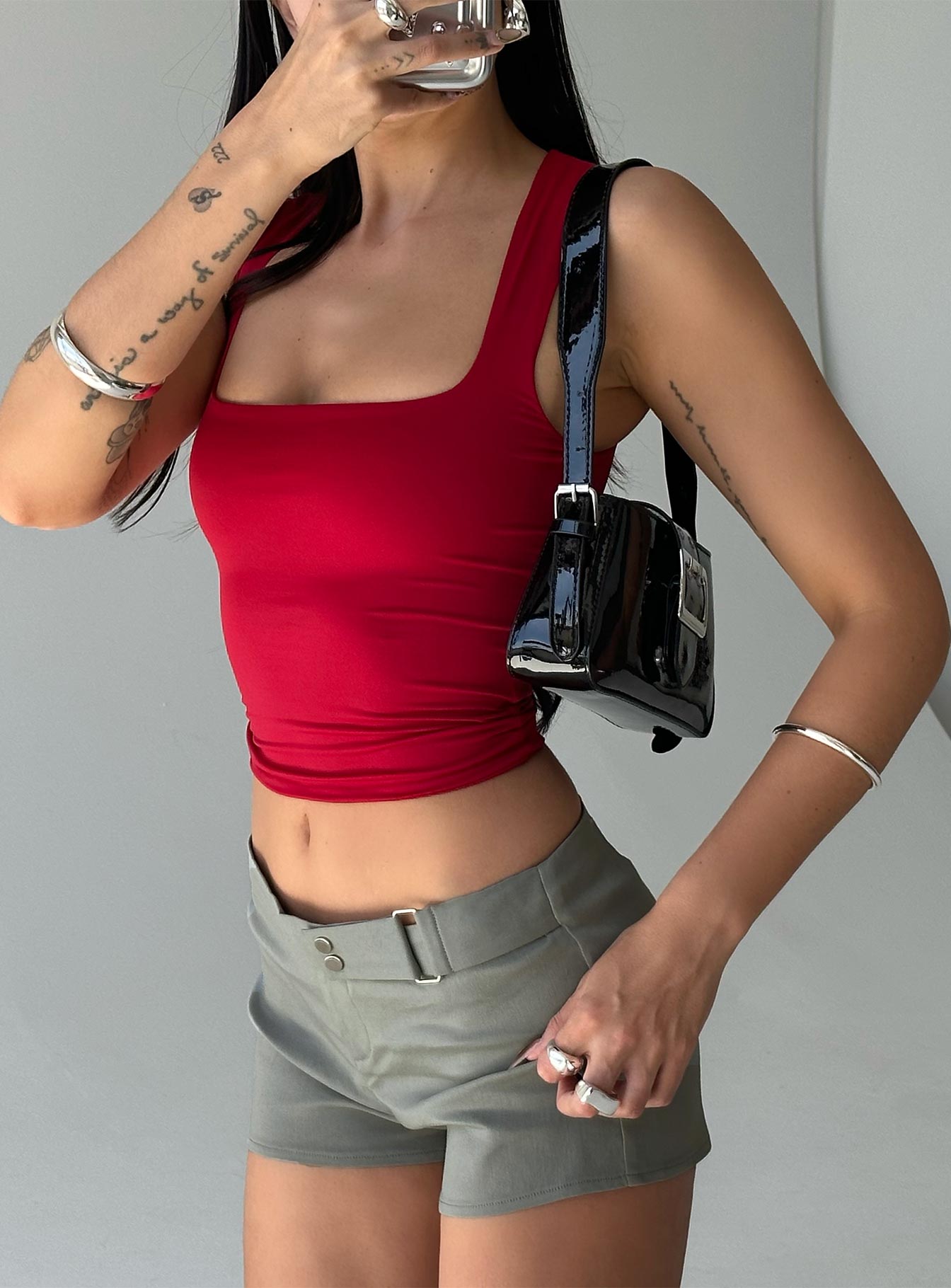 Front view of model wearing  front Princess Polly Sleeveless Square Neck  Back In Time Top Red