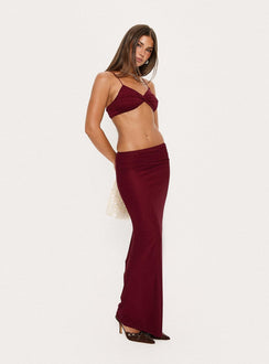   side view of model wearing Princess Polly Delores Ruched Maxi Skirt Red Maxi Skirts 
