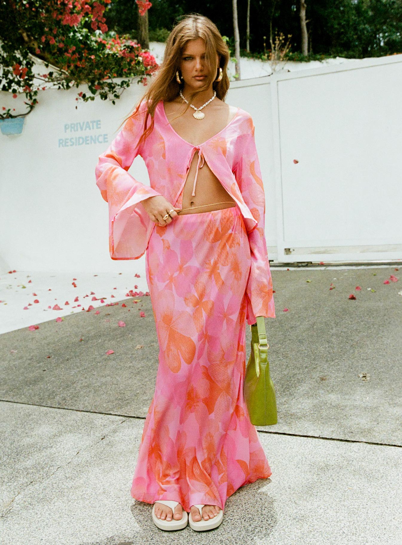 Long sleeve floral top Scooped neckline, tie fastening at bust