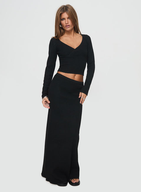 back view of model wearing Princess Polly Memi Long Sleeve Top Black Full Sleeves V-Neck 