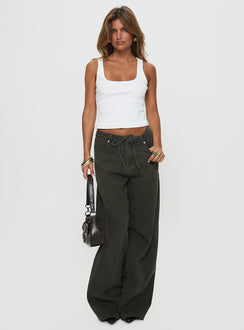 front view of model wearing Princess Polly Bruiser Tie Waist Mid Rise Wide Leg Jeans Green High Rise Jeans 