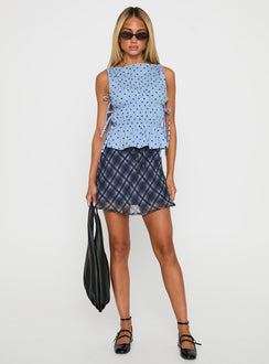   side view of model wearing Princess Polly Orellia Mini Skirt Blue Check Mini Skirts 