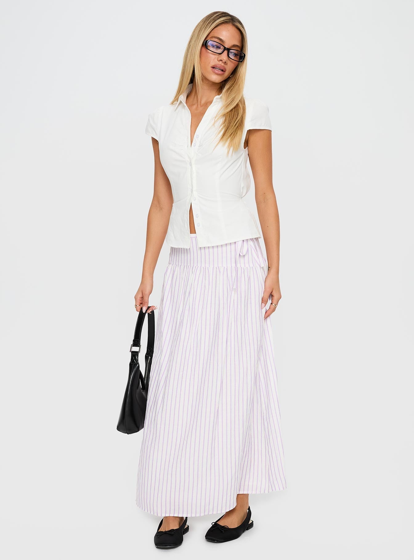   side view of model wearing Princess Polly Antheia Maxi Skirt White Multi Maxi 