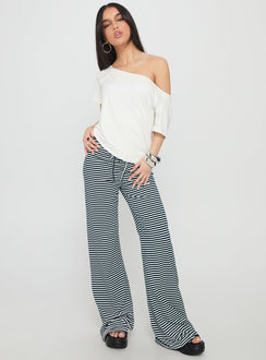 side view of model wearing Princess Polly Alfreda Jersey Pant Navy Stripe High Waisted Pants 
