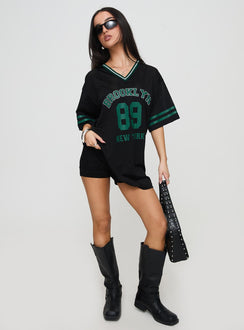 side view of model wearing Princess Polly Michail Jersey Mini Dress Green V-Neck 