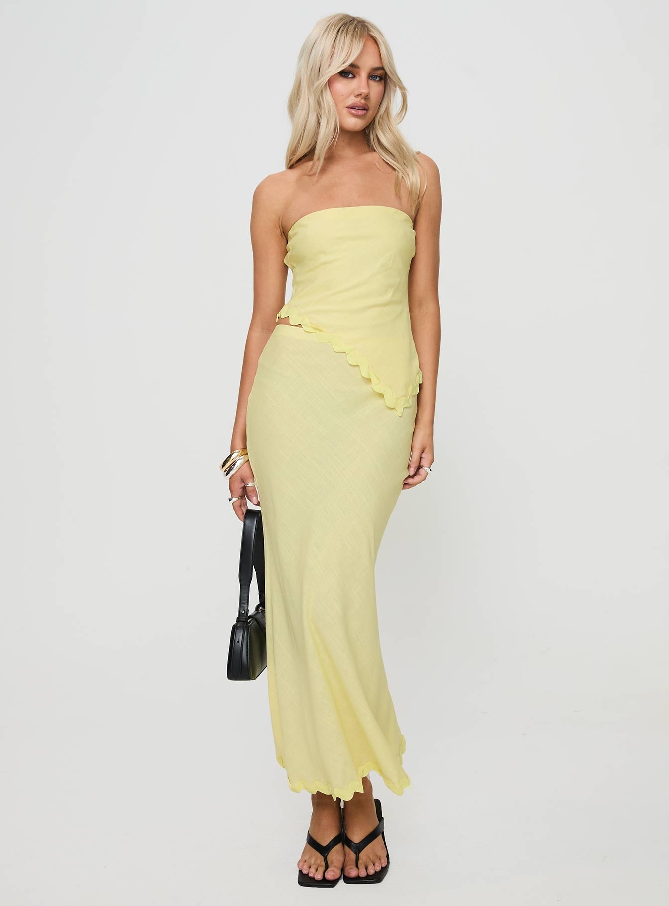   front view of model wearing Princess Polly Silvershore Maxi Skirt Yellow Maxi 