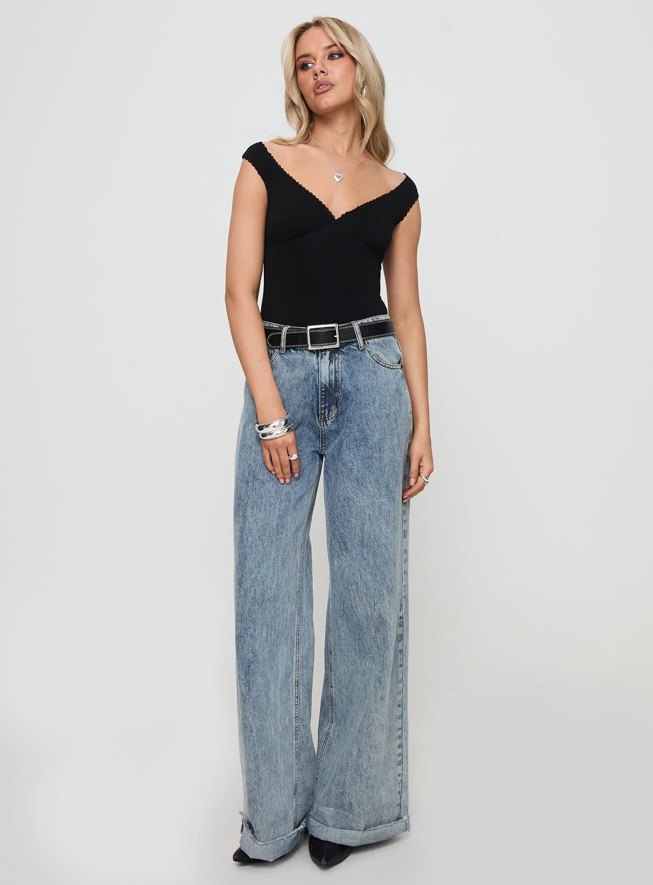 front view of model wearing Princess Polly Faure Bodysuit Black Sleeveless V-Neck 