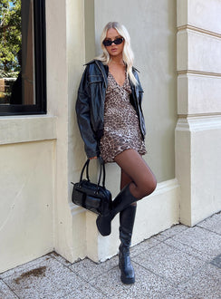 side view of model wearing Princess Polly Nellie Mini Dress Leopard Tall Plunger 