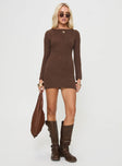Long sleeve mini dress Boucle material, low back, sheer knit, tie fastening at back  Good stretch, unlined 