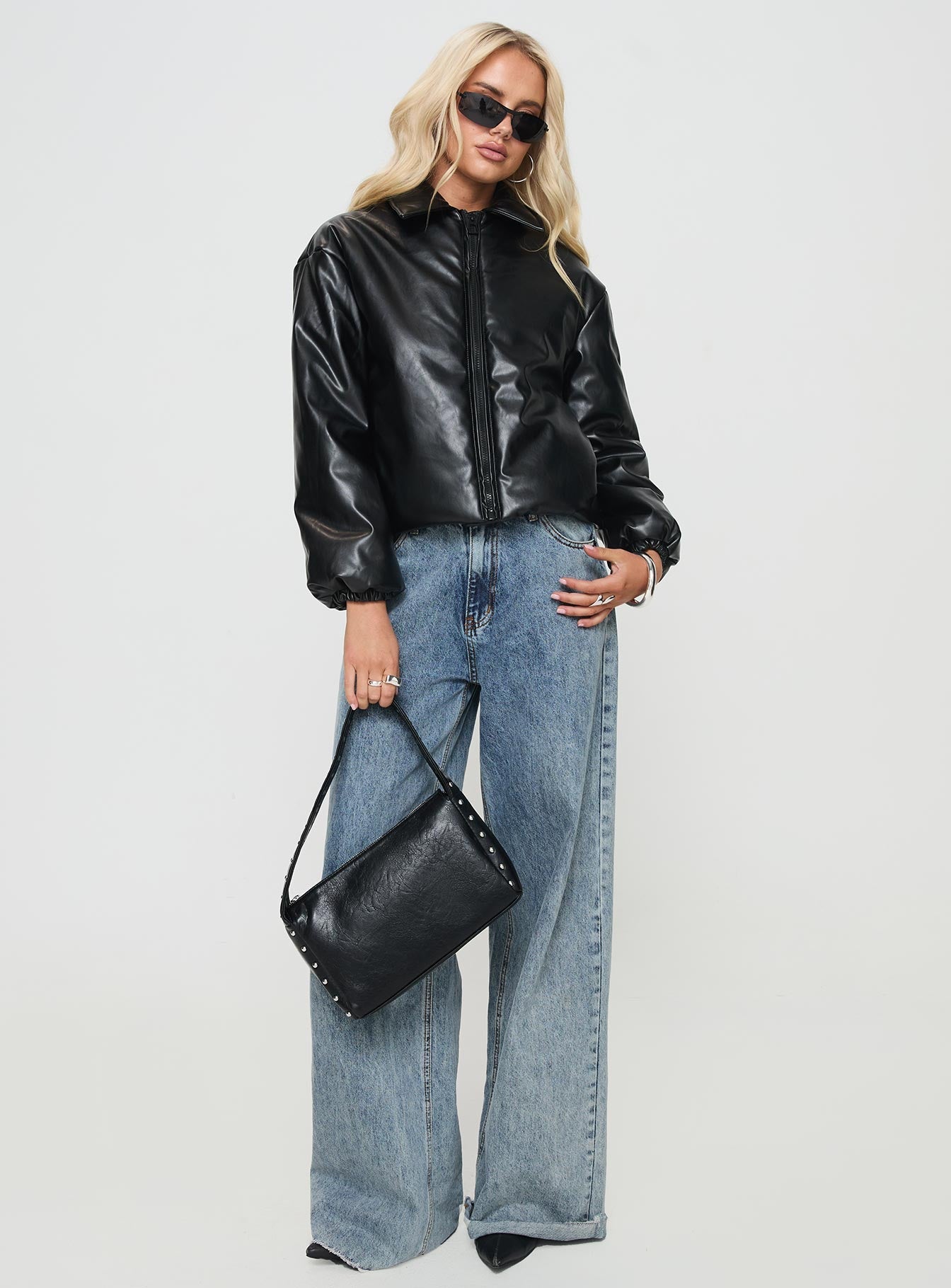 Black jacket Classic collar, exposed zip fastening, drawstring at waist, twin pockets