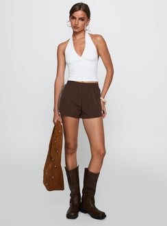 front view of model wearing Princess Polly Borderline Track Short Brown / Blue High Waisted Shorts 