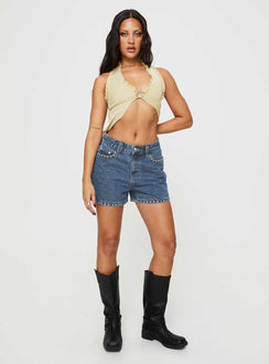 Denim shorts High rise fit, silver studded detailed, classic five pocket design, belt loops at waist, zip and button fastening, branded patch at back
