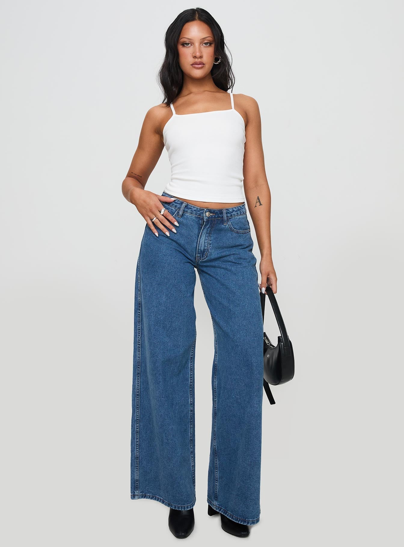 back view of model wearing Princess Polly Baseline Rib Top White Sleeveless Square Neck 