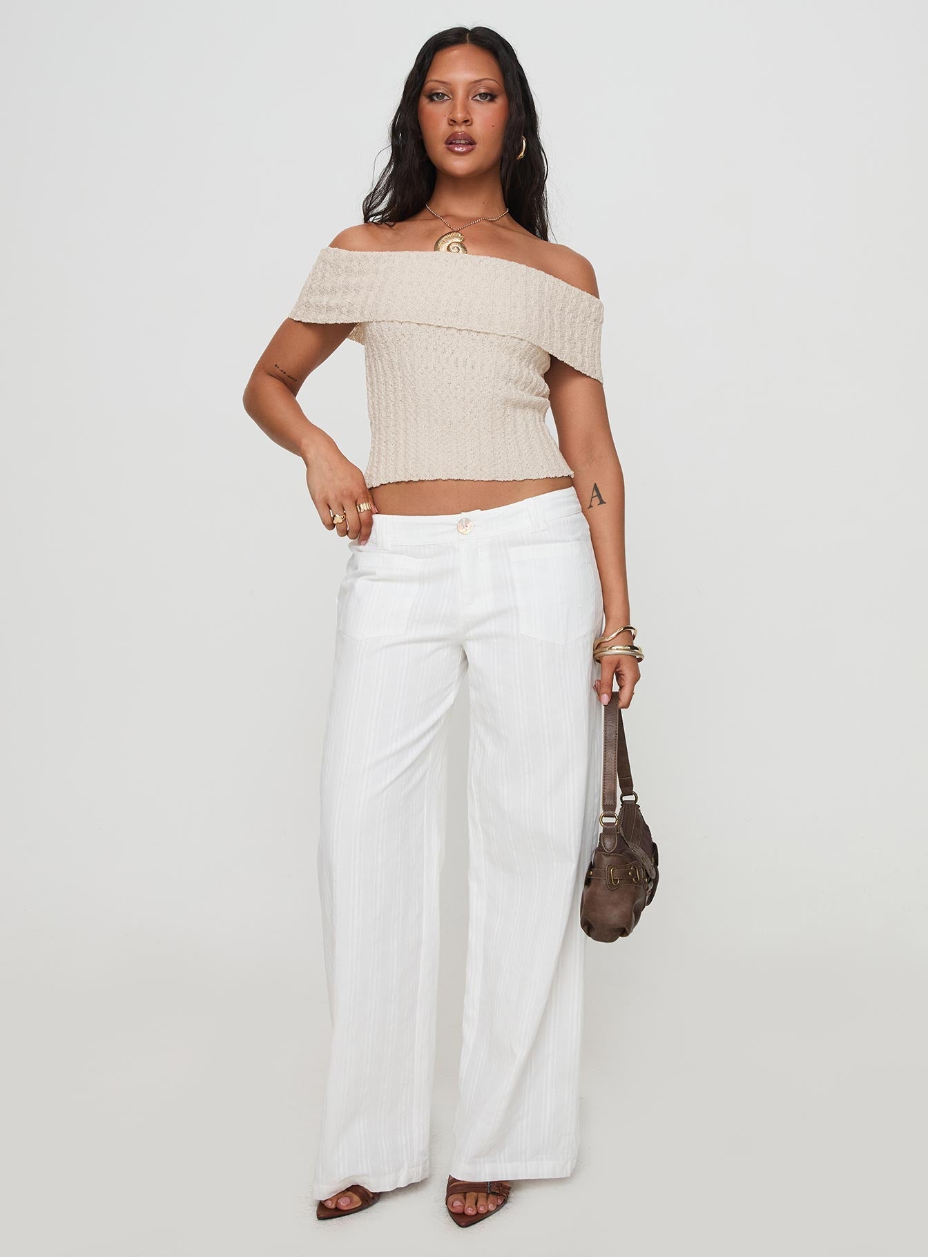 front view of model wearing Princess Polly Vendi Low Rise Pant White Low Rise Pants 