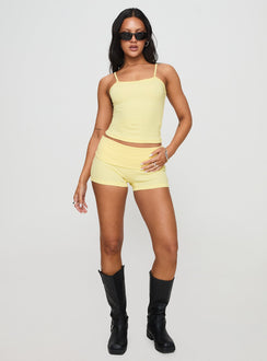front view of model wearing Princess Polly Baseline Rib Top Yellow Sleeveless Square Neck 