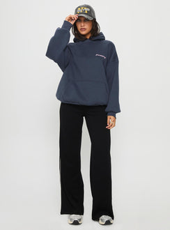 side view of model wearing Princess Polly Ascenda Straight Leg Track Pant Black High Waisted Pants 